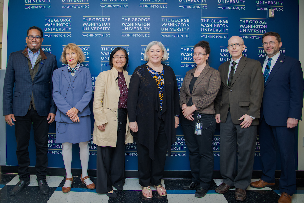 Panelists and moderator pictured with GW's President and Vice Provost