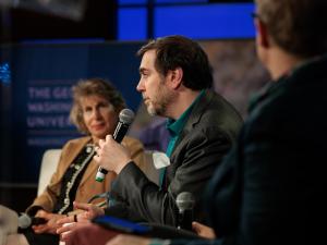 Professors Susan Ariel Aaronson and David Broniatowski on the stage at TRAILSCon 2025